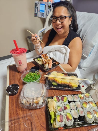 Rowena eating her delicious post-L&D meal of sushi and bubble tea,